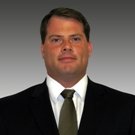 Headshot of Mr. Brian Hartwig, Vice President ABM