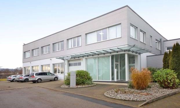 Main entrance view of ATS Life Sciences building in Urbach, Germany