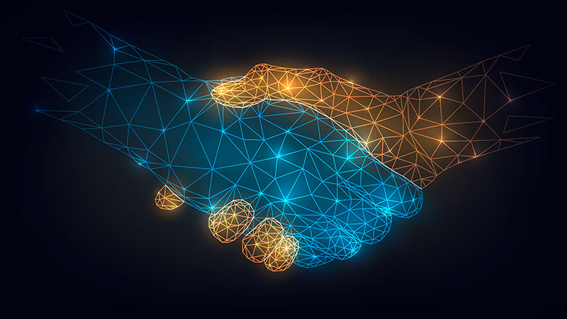 shutterstock_1479701399-Converted-partnership-handshake