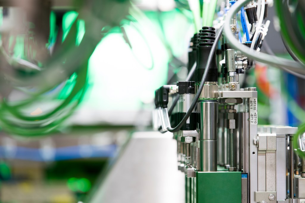A close-up view of a mechanical assembly inside a machine